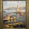 Denizde tekneler, Kız Kulesi ve arka planda cami silüetlerinin yer aldığı çerçeveli yağlı boya İstanbul manzarası.